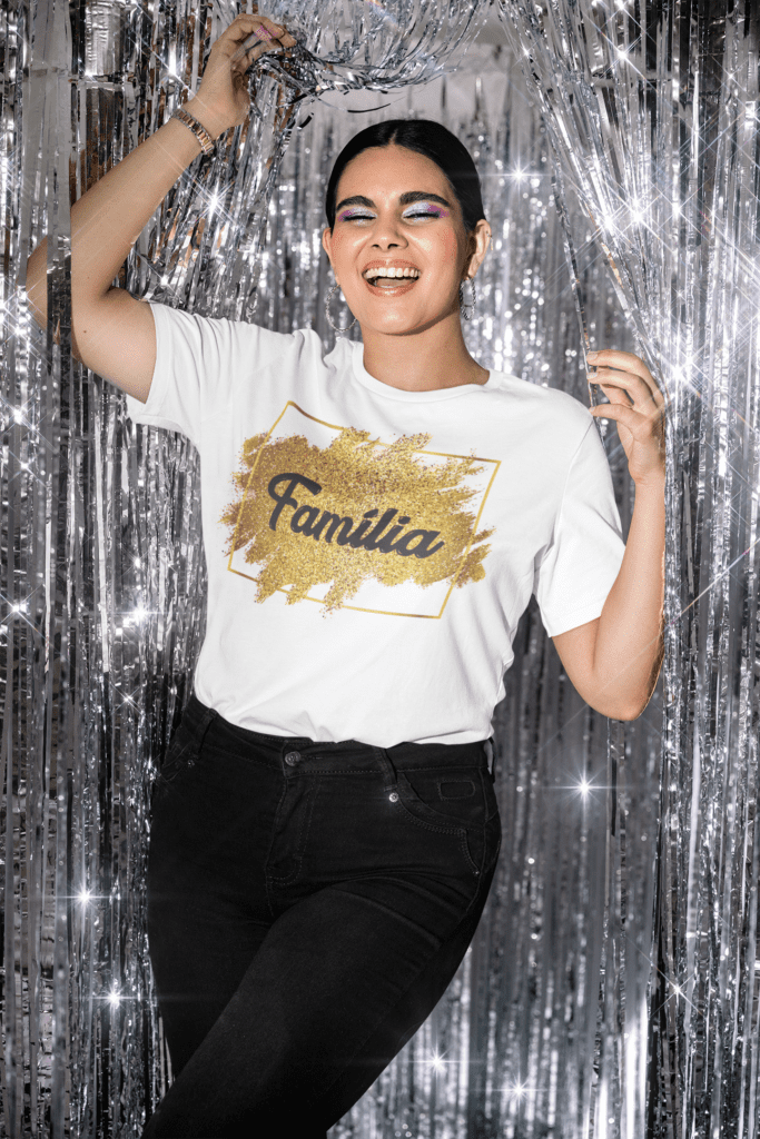 bella-canvas-tee-mockup-of-a-joyful-woman-in-a-new-year-s-decorated-setting-m30486-8 Estampas Ano Novo Luz - Camisas (Ana Melin) - Imagem 5